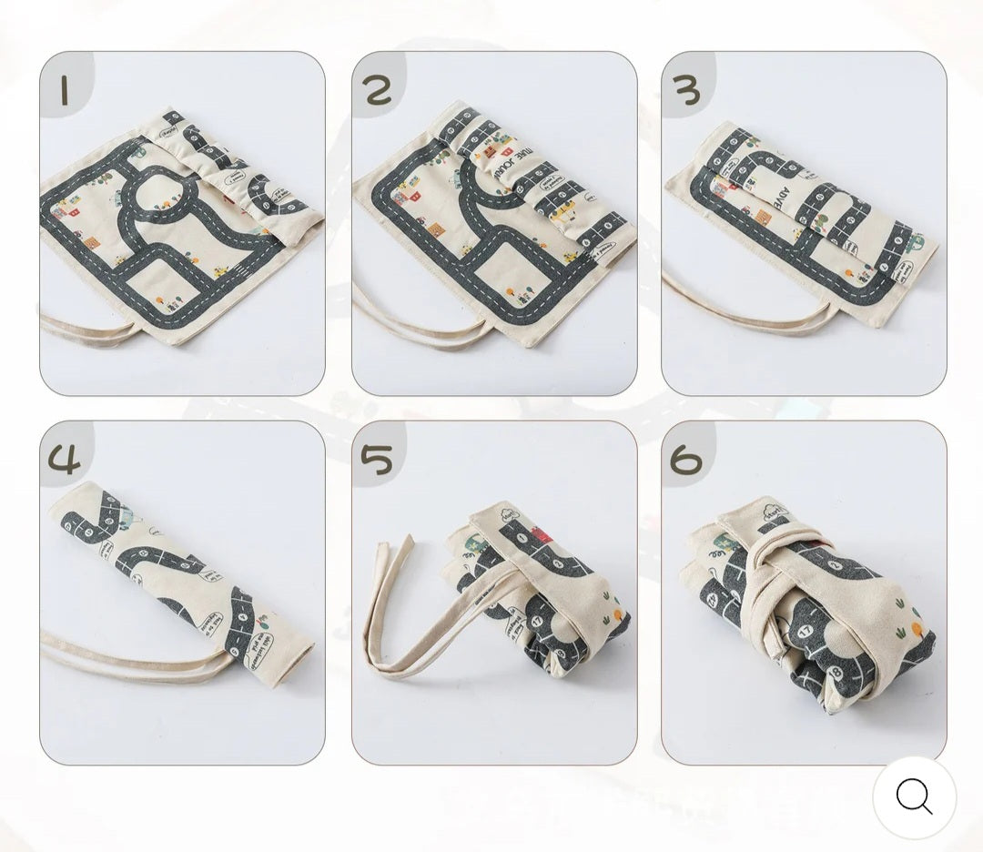 Double-sided, roll-up, canvas playmat with wooden cars.